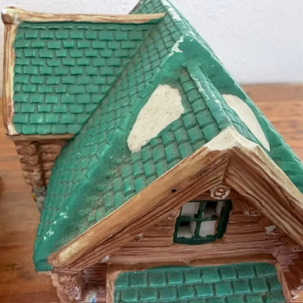 Seasonal Specialties Outfitters Shop and Christmas Village Log Cabin